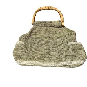 Tan crochet handbag with bamboo handles